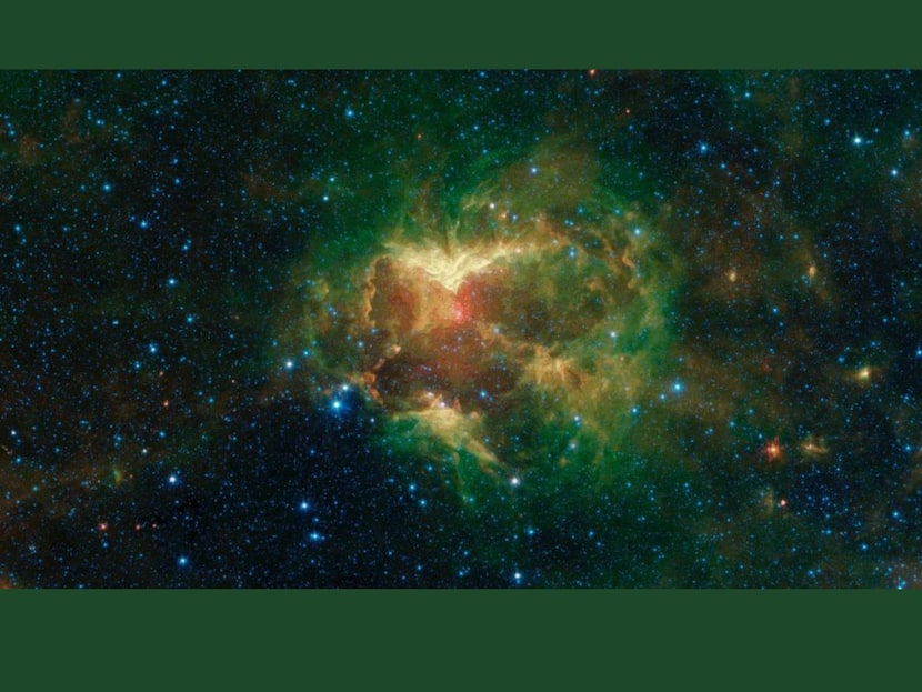 NASA's Spitzer Telescope Captures 'Jack-O-Lantern Nebula' Halloween Pumpkin Decorating Milky Way Galaxy See PIC