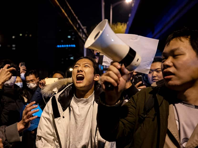 Protestors Chant In China, BBC Says Its Journalist 'Beaten, Arrested' By Police